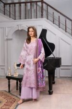 Model wearing lavender dhanak suit with digital print, embroidery and floral wool shawl by Munira Designers