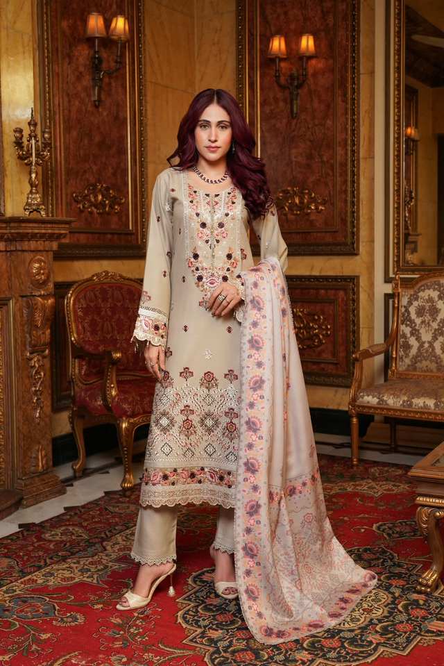 Mahi Beige Dhanak Suit Front View Woman wearing Mahi beige Dhanak suit with embroidered neckline and printed wool shawl